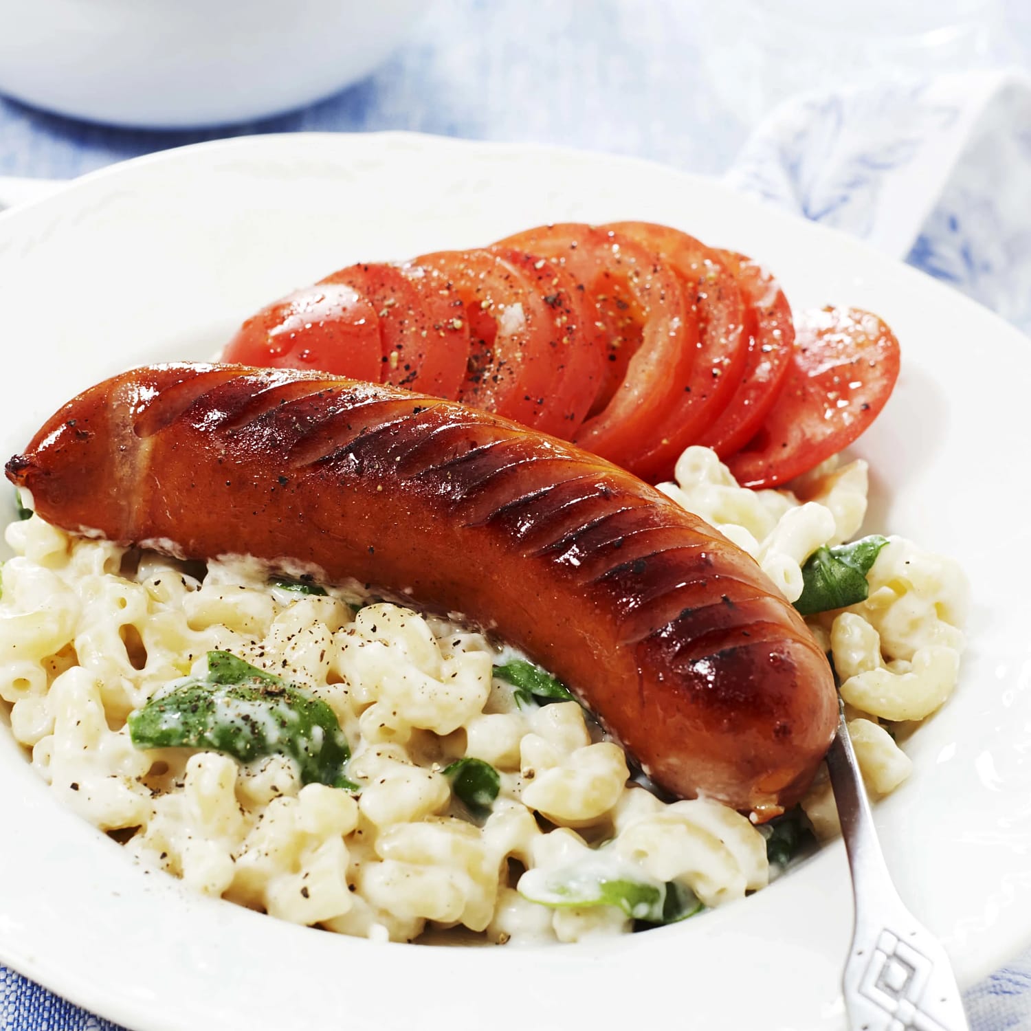 Bacon & äpplekorv med spenatstuvade makaroner