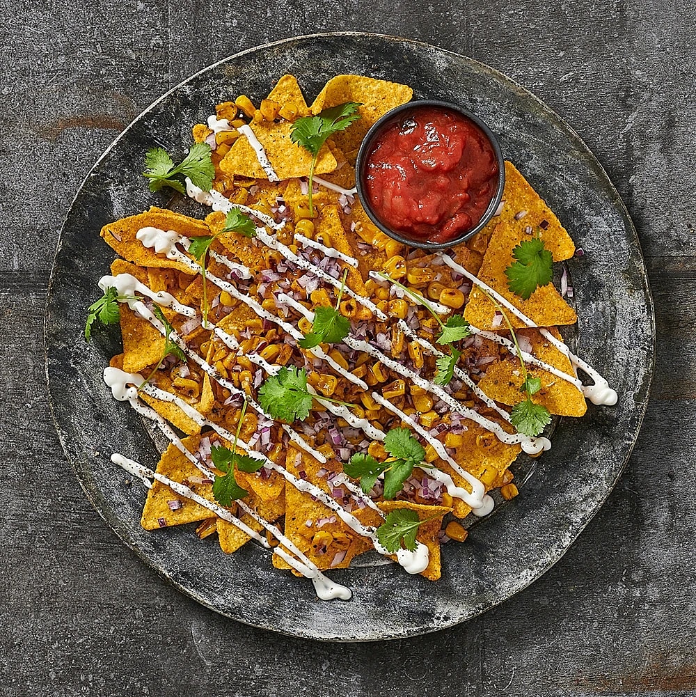 Guajillochips med habanerokryddad topping och koriander