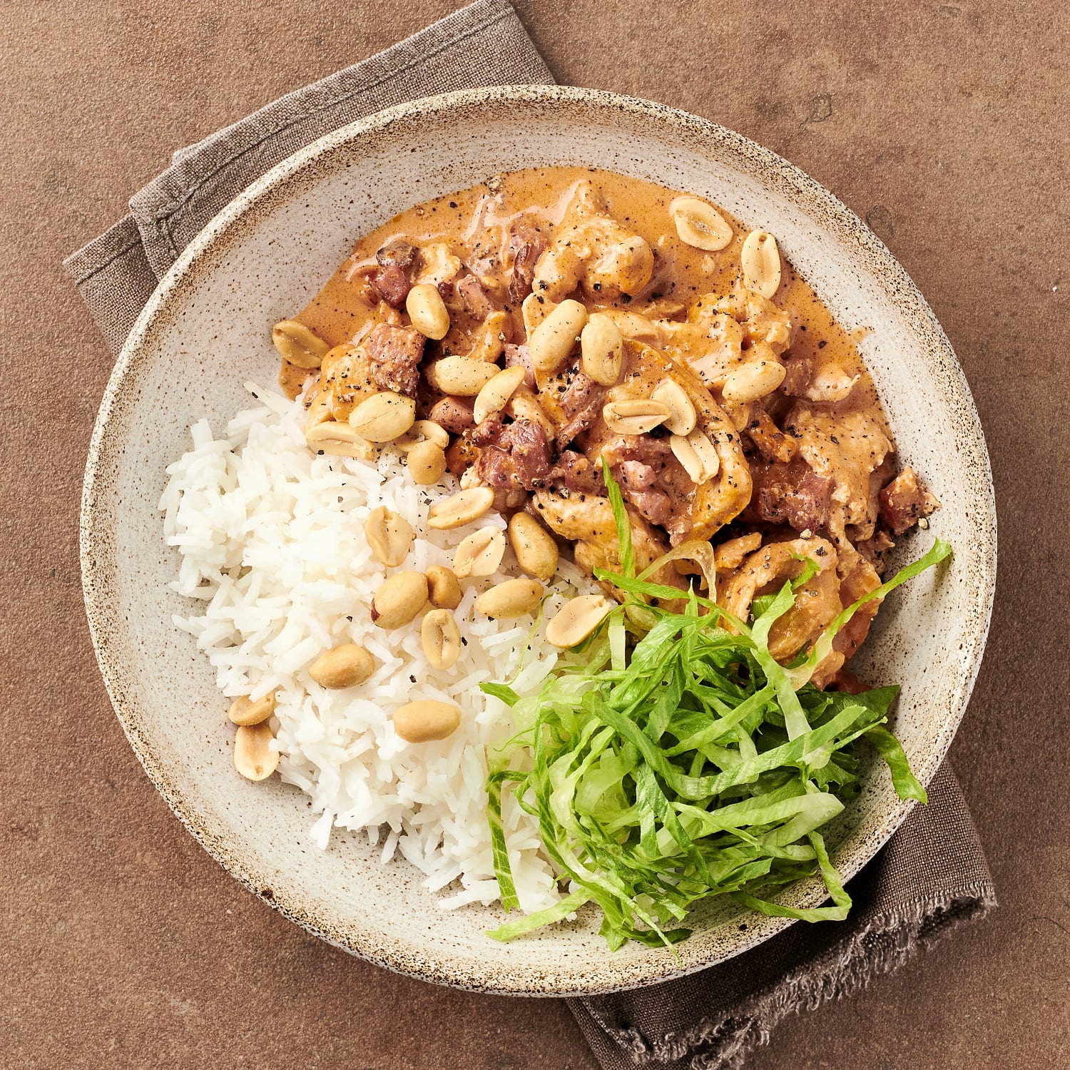 Kycklinggryta med bacon och jordnötter