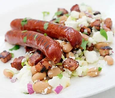 Lammkorv med bönsallad och muscovadoglacerat sidfläsk