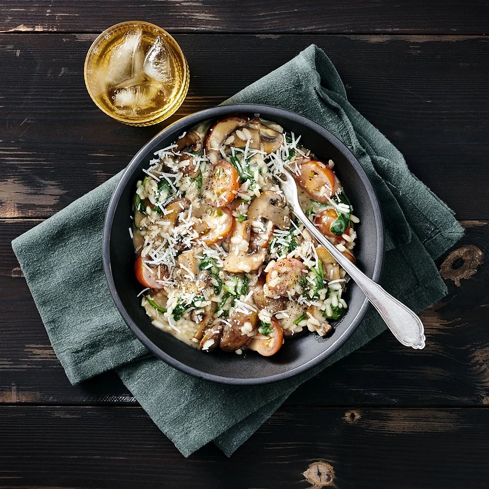 Risotto med svamp, spenat och tomater