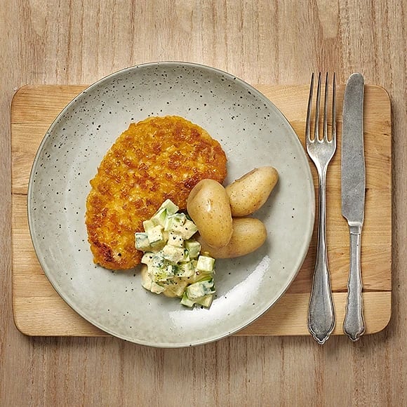 Stekt schnitzel med gul gurkröra